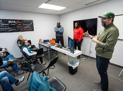 Dr. James Bigham teaching gun safety.