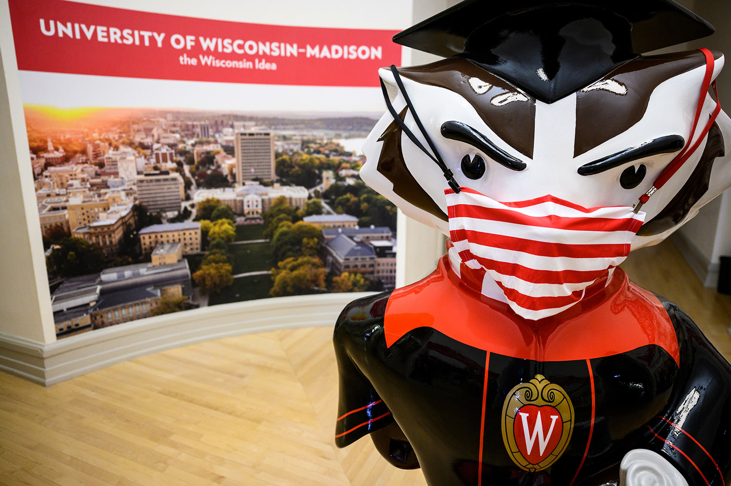 The Graduation Bucky statue is pictured wearing a face mask in the rotunda of Bascom Hall at the University of Wisconsin-Madison on Nov. 21, 2020. 