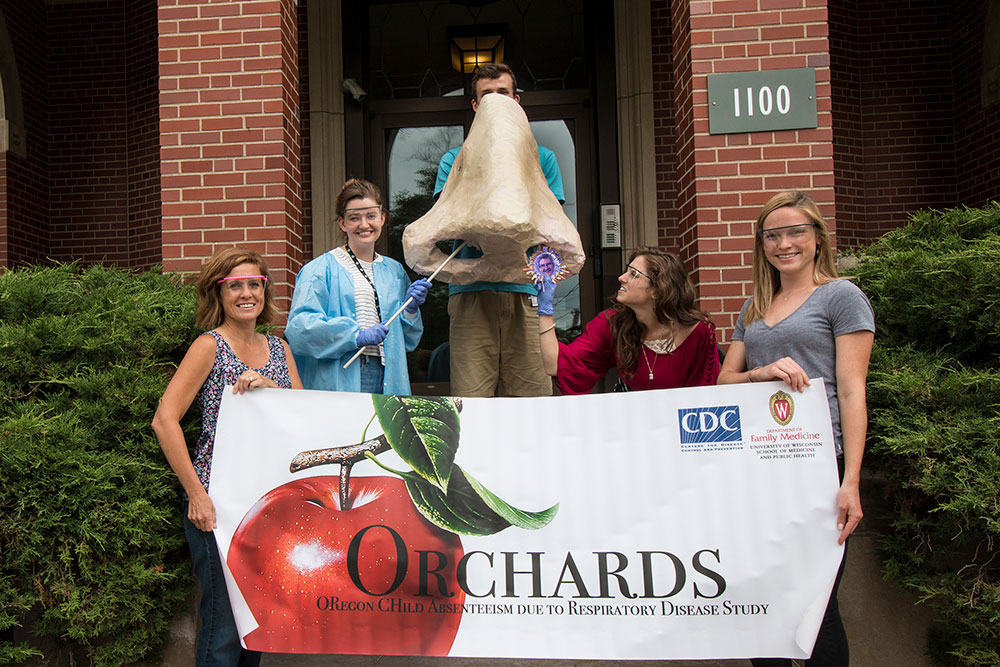 ORCHARDS Research study group photo on steps of Alumni Hall.