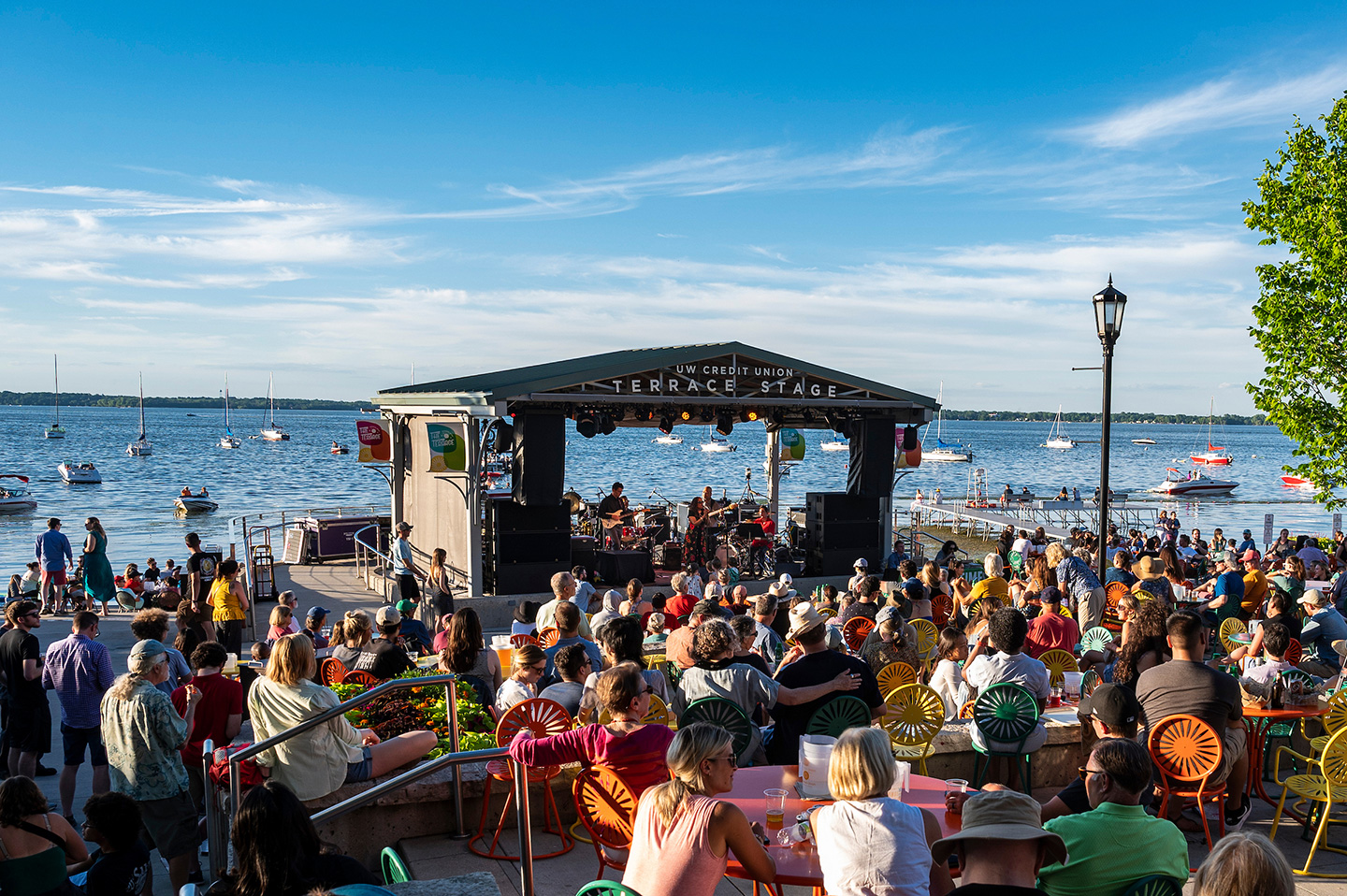 Members of the Madison community enjoy a warm summer evening while listening to the sounds of the Donna Woodall Group at a Madison Jazz Festival event held at the Memorial Union Terrace at the University of Wisconsin-Madison.