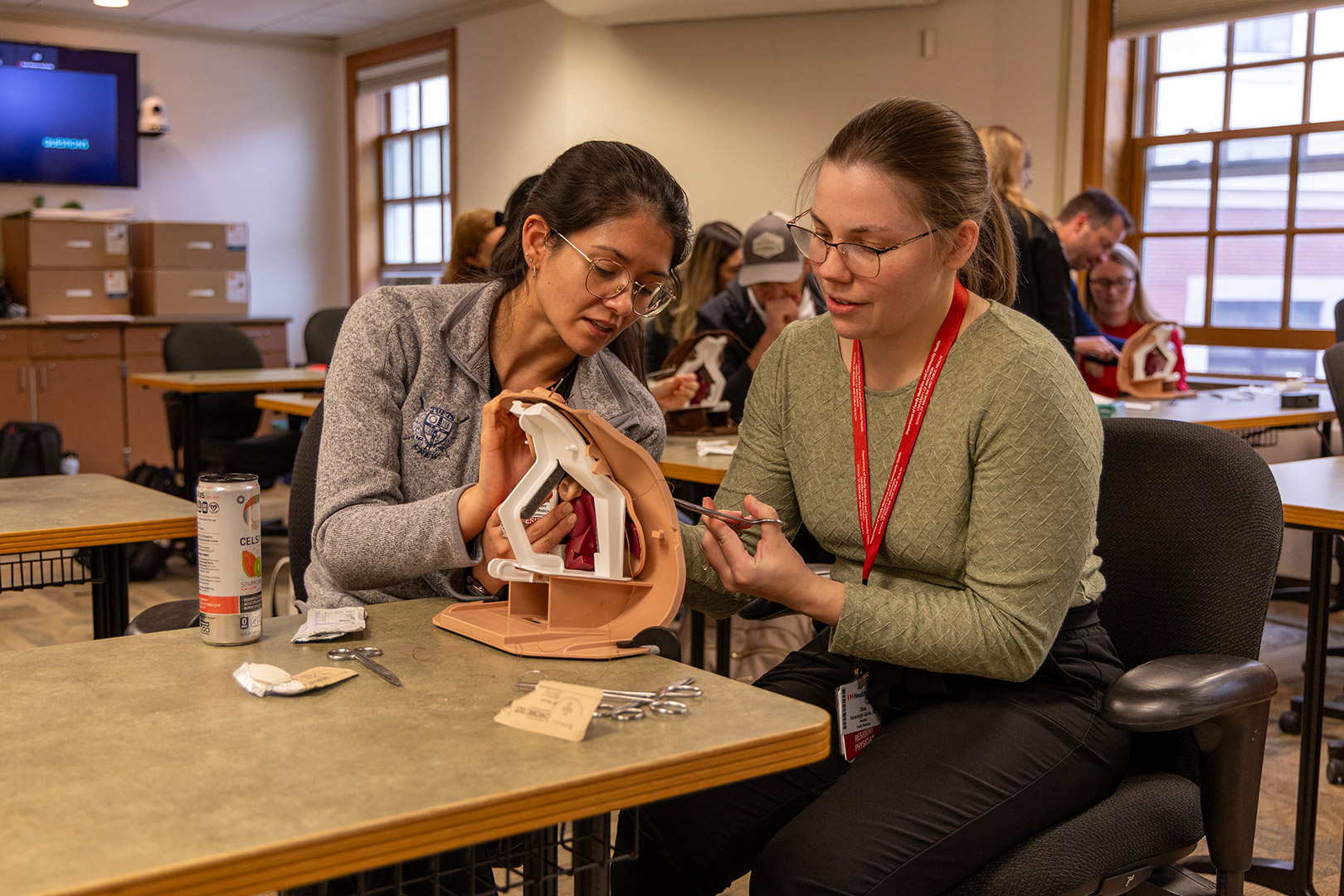 Madison residents practice a procedure in a class setting.