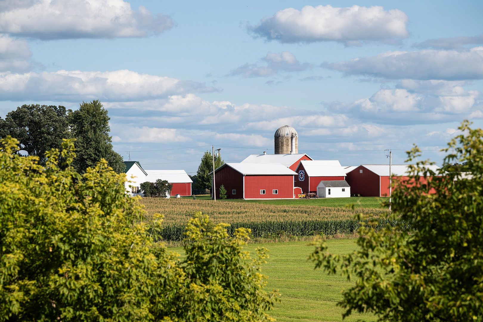 Rural farmland with a red barn is pictured outside of Beaver Dam, Wis., during a late summer day, on September.