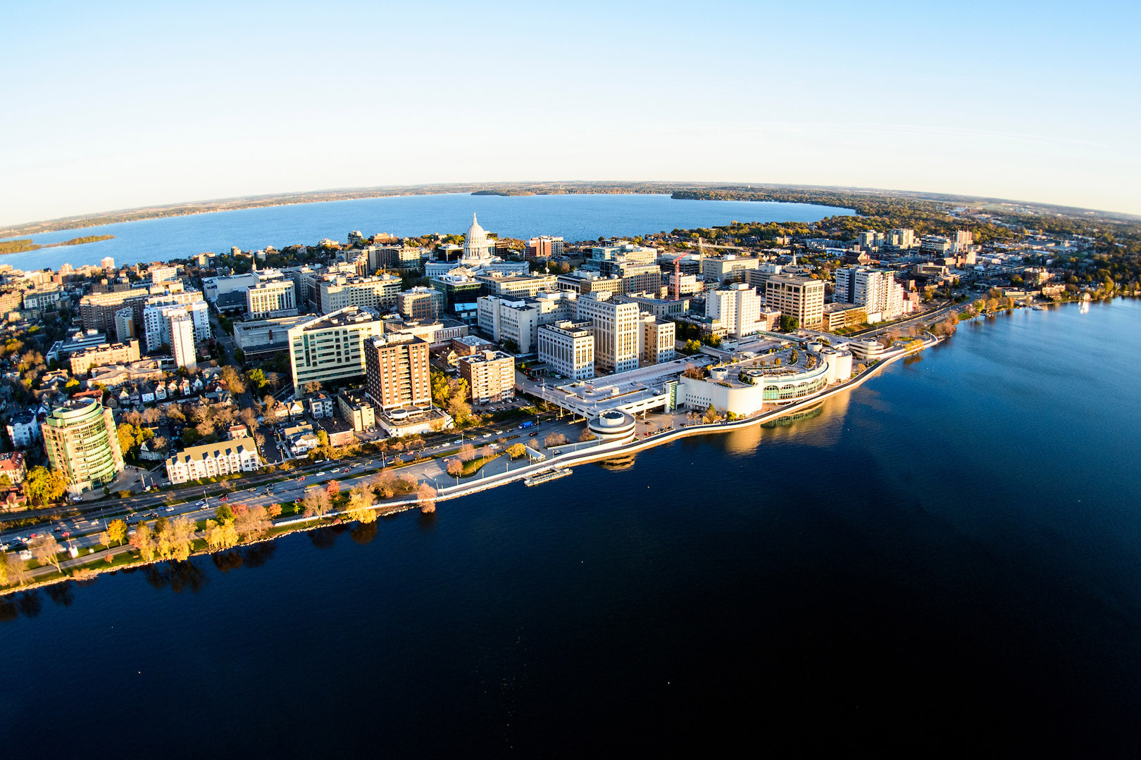Lake Mendota and Lake Monona, along with the downtown Madison Isthmus and Wisconsin State Capitol, are pictured in an early morning aerial taken from a helicopter.