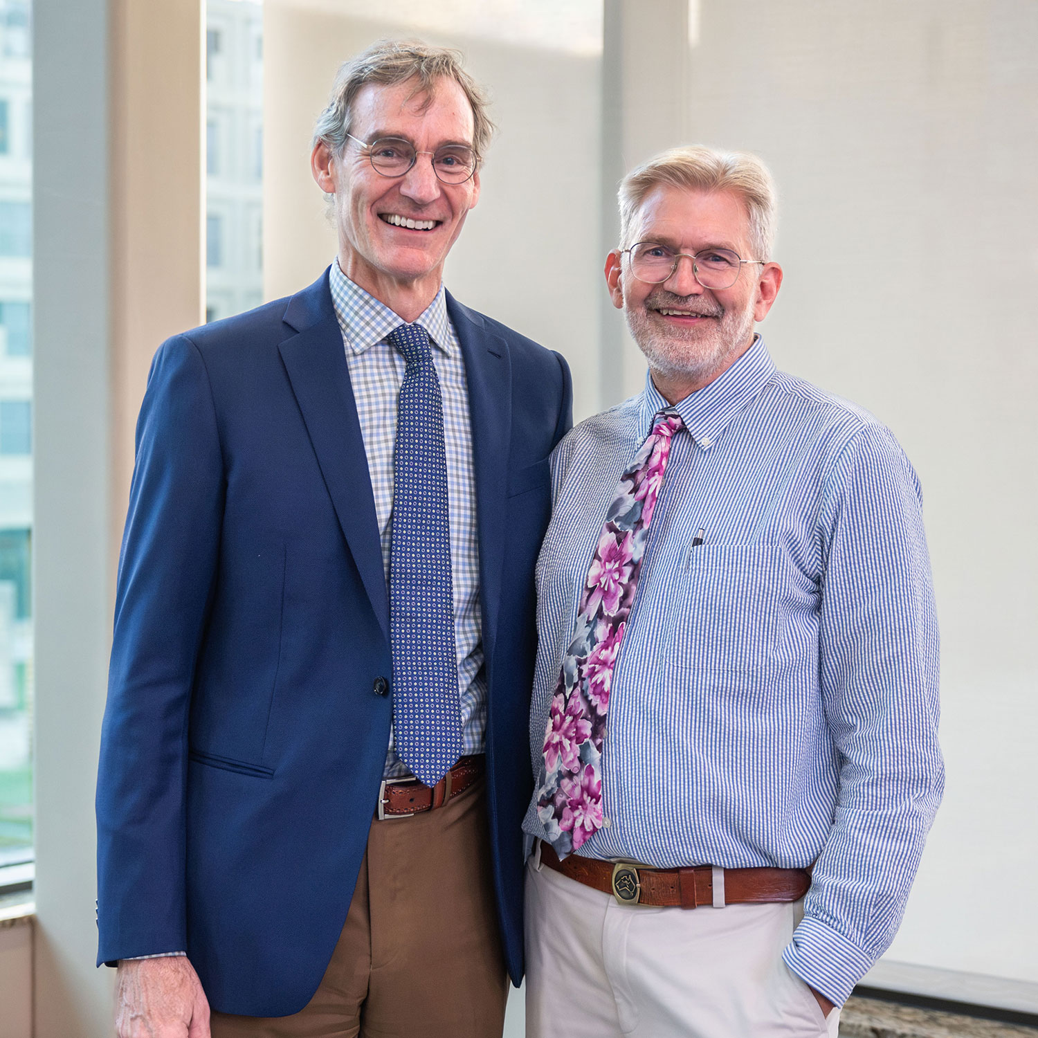 Dr. Dave Rakel with Award recipient Dr. Jon Temte.